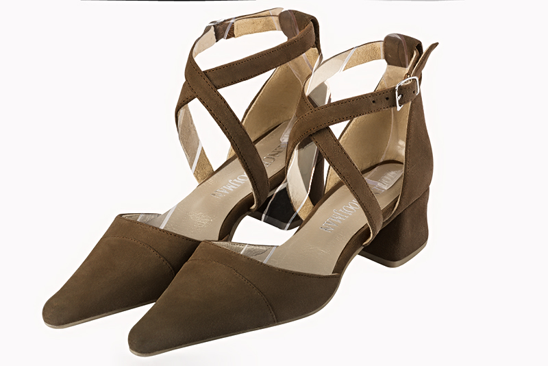 Chocolate brown women's open side shoes, with crossed straps. Pointed toe. Low flare heels. Front view - Florence KOOIJMAN
